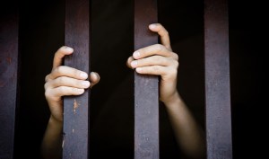 hands_bars_prison_jail
